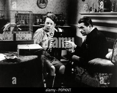 Original Film Title: SABOTAGE.  English Title: A WOMAN ALONE.  Film Director: ALFRED HITCHCOCK.  Year: 1936.  Stars: OSCAR HOMOLKA. Credit: GAUMONT-BRITISH / Album Stock Photo