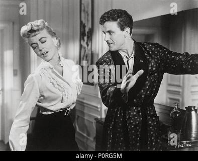 Original Film Title: WRITTEN ON THE WIND.  English Title: WRITTEN ON THE WIND.  Film Director: DOUGLAS SIRK.  Year: 1956.  Stars: ROBERT STACK; DOROTHY MALONE. Credit: UNIVERSAL PICTURES / Album Stock Photo