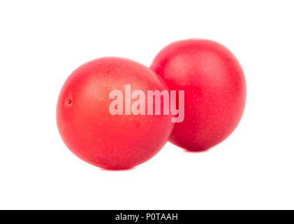 Two ripe red cherry plums on a white background Stock Photo