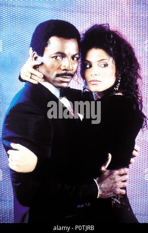 Original Film Title: ACTION JACKSON.  English Title: ACTION JACKSON.  Film Director: CRAIG R. BAXLEY.  Year: 1988.  Stars: CARL WEATHERS; VANITY. Credit: LORIMAR / Album Stock Photo