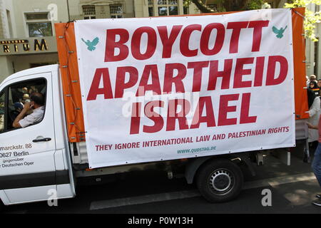 Berlin, Germany. 09th June, 2018. Approximately 2000 participants of the anti-Israel al-Quds demonstration are passing through Berlin. The police accompany the event with the utmost vigilance. Every year it comes to anti-Semitic incitement and crime. The protest now attracts extremists of the political spectrum, from sympathizers of Hamas and Hizballah to neo-Nazis. Motto of the event 'Crusade against Islam? Together against the injustice on the street!'. Credit: Simone Kuhlmey/Pacific Press/Alamy Live News Stock Photo