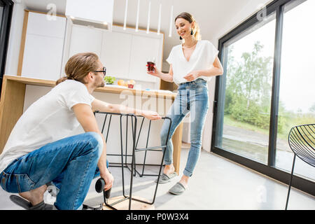 Couple doing house chores at the modern apartment Stock Photo