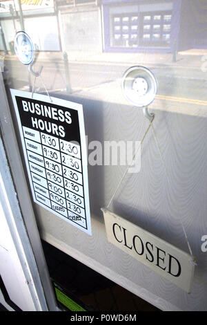 Opening hours in a small cafe in Dinnington South Yorkshire an old mining town Stock Photo