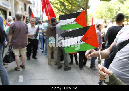 Berlin, Germany. 09th June, 2018. Approximately 2000 participants of the anti-Israel al-Quds demonstration are passing through Berlin. The police accompany the event with the utmost vigilance. Every year it comes to anti-Semitic incitement and crime. The protest now attracts extremists of the political spectrum, from sympathizers of Hamas and Hizballah to neo-Nazis. Motto of the event 'Crusade against Islam? Together against the injustice on the street!'. Credit: Simone Kuhlmey/Pacific Press/Alamy Live News Stock Photo