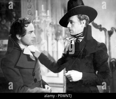 Original Film Title: THE SCARLET PIMPERNEL.  English Title: THE SCARLET PIMPERNEL.  Film Director: HAROLD YOUNG.  Year: 1934.  Stars: LESLIE HOWARD; WALTER RILLA. Credit: LONDON FILMS/UNITED ARTISTS / Album Stock Photo