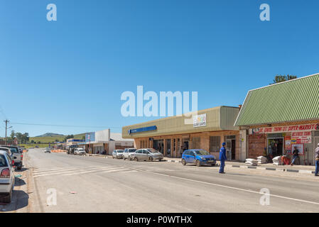 ELLIOT, SOUTH AFRICA - MARCH 28, 2018: A street scene, with businesses, vehicles and people, in Elliot in the Eastern Cape Province Stock Photo