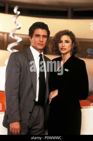 Original Film Title: SOMEONE TO WATCH OVER ME.  English Title: SOMEONE TO WATCH OVER ME.  Film Director: RIDLEY SCOTT.  Year: 1987.  Stars: MIMI ROGERS; TOM BERENGER. Credit: COLUMBIA PICTURES / Album Stock Photo