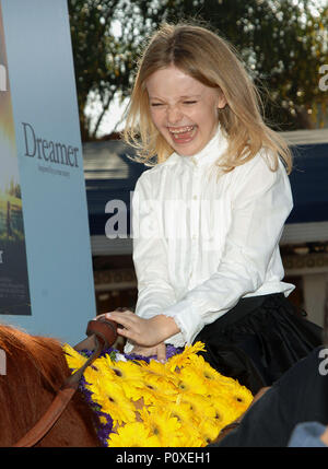 Dakota Fanning arriving at the DREAMER Premiere at the Westwood Man Theatre in Los Angeles. October 9, 2005.02 FanningDakota061 Red Carpet Event, Vertical, USA, Film Industry, Celebrities,  Photography, Bestof, Arts Culture and Entertainment, Topix Celebrities fashion /  Vertical, Best of, Event in Hollywood Life - California,  Red Carpet and backstage, USA, Film Industry, Celebrities,  movie celebrities, TV celebrities, Music celebrities, Photography, Bestof, Arts Culture and Entertainment,  Topix, vertical, one person,, from the years , 2003 to 2005, inquiry tsuni@Gamma-USA.com - Three Quart Stock Photo