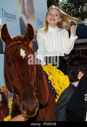 Dakota Fanning arriving at the DREAMER Premiere at the Westwood Man Theatre in Los Angeles. October 9, 2005.02 FanningDakota098 Red Carpet Event, Vertical, USA, Film Industry, Celebrities,  Photography, Bestof, Arts Culture and Entertainment, Topix Celebrities fashion /  Vertical, Best of, Event in Hollywood Life - California,  Red Carpet and backstage, USA, Film Industry, Celebrities,  movie celebrities, TV celebrities, Music celebrities, Photography, Bestof, Arts Culture and Entertainment,  Topix, vertical, one person,, from the years , 2003 to 2005, inquiry tsuni@Gamma-USA.com - Three Quart Stock Photo