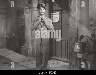 Original Film Title: EL PORTERO.  English Title: EL PORTERO.  Film Director: MIGUEL M. DELGADO.  Year: 1950.  Stars: CANTINFLAS. Credit: POSA FILMS, S.A. / Album Stock Photo