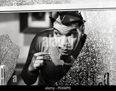 Original Film Title: EL PORTERO.  English Title: EL PORTERO.  Film Director: MIGUEL M. DELGADO.  Year: 1950.  Stars: CANTINFLAS. Credit: POSA FILMS, S.A. / Album Stock Photo