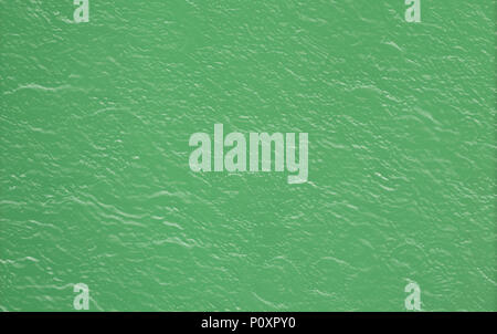 The background image is green with a relief pattern. Stock Photo