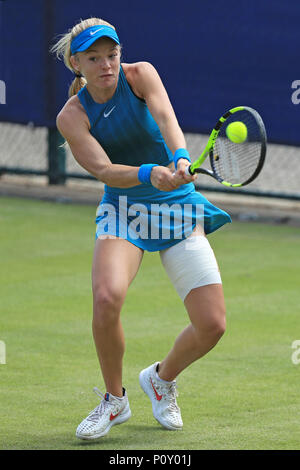 Paula Badosa of Spain plays a backhand return to Coco Gauff of the U.S ...