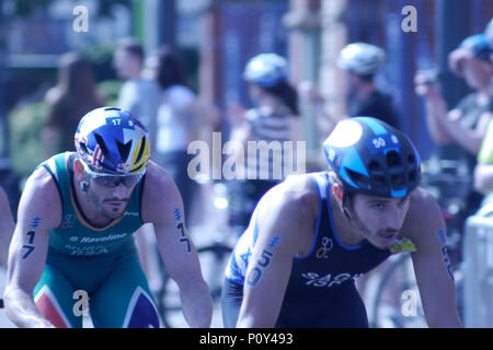Leeds, UK, 10th June 2018. Richard Murray, Number 17, of RSA, during the cycle, with Sagir Shachar, number 50, from Israel, on his way to winning the ITU World Triathlon Leeds. Credit: Jonathan Sedgwick/ Alamy Live News. Stock Photo