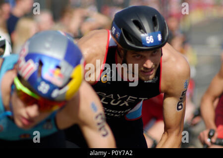 Leeds, UK. 10th June 2018. Gregor Payet, number 56, of Luxembourg, during the bike section of the ITU World series Triathlon Leeds mens' event. Credit: Jonathan Sedgwick/ Alamy Live News. Stock Photo