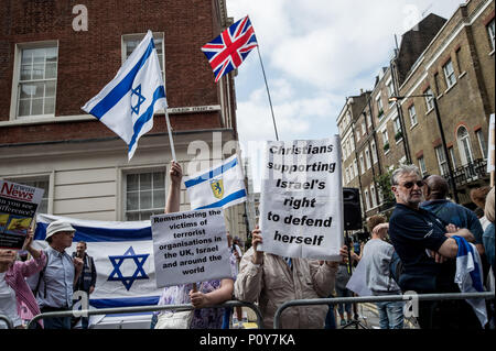The Israeli flag seen at the pro-zionist counter-demo.  Hundreds of anti-Israel protesters marched through the streets on the annual Al Quds Day. Started by the Ayatollah Khomeini in 1979 to show support for Palestine and oppose the existence of Israel and the counter protest from the Zionist Federation. Stock Photo