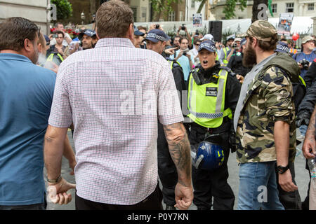 London, UK - 10 June 2018:  As women marched through London to celebrate the centenary of women getting the vote, nearby in Mayfair women were on the front line of an aggressive counter-demonstration as Free Tommy Robinson supporters abused Muslims on an Quds Day anti-Israeli demonstration. Credit: On Sight Photographic/Alamy Live News Stock Photo