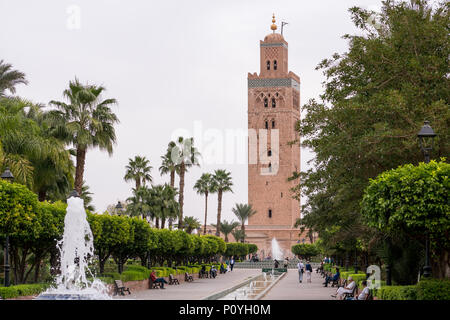 Marrakesh, Morocco - November 08, 2017: View of the Koutoubia Mosque in Marrakesh from Lalla Hasna park with palm trees in the foreground Stock Photo