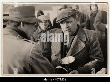 THE CZECHOSLOVAK SOCIALIST REPUBLIC, CIRCA 1960s: Vintage photo shows men after hunting, circa 1960s. Stock Photo