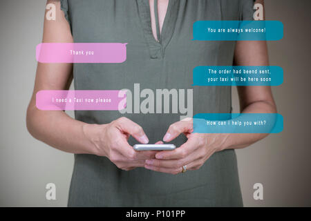 Woman chatting with a chatbot on her smartphone to book a taxi, modern technology simplifies everyday tasks and enhances convenience, tech concept Stock Photo