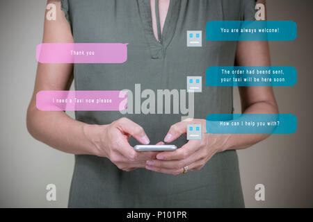 Woman chatting with a chatbot on her smartphone to book a taxi, highlighting how modern tech streamlines daily life and makes tasks more efficient Stock Photo
