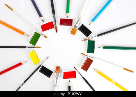 Watercolor pencils are arranged by color in cells on a stationery store  shelf. A variety of professional colored pencils for artists and designers.  Sh Stock Photo - Alamy