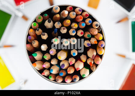 Large set of colored pencils pointing up - top view Stock Photo