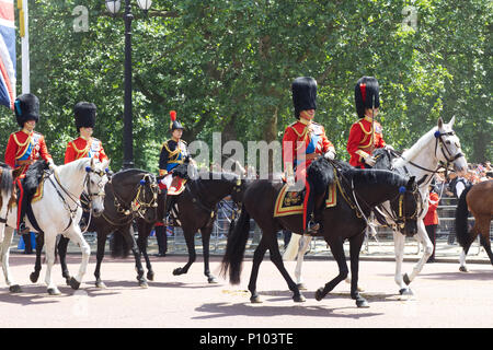 Royal family attending Trooping the colour, Prince William, Prince Charles, Prince Andrew and Princess Anne on horseback behind the Queens Carriage Stock Photo