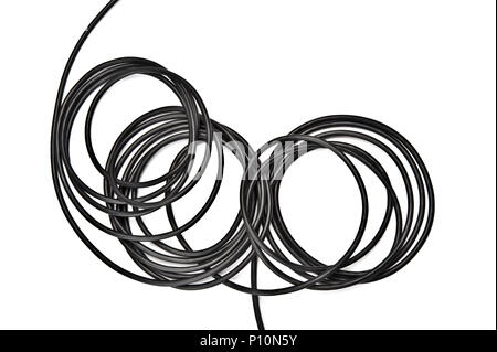 Black electric cable on white background. Stock Photo