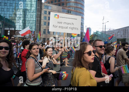 Warsaw, Poland - June 9, 2018: Participants of large Equality Parade - LGBT community pride parade in Warsaw city. Placard 'We march for equal rights Stock Photo