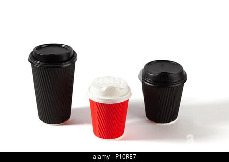 Black and red disposable coffee cups on white background with copy space Stock Photo