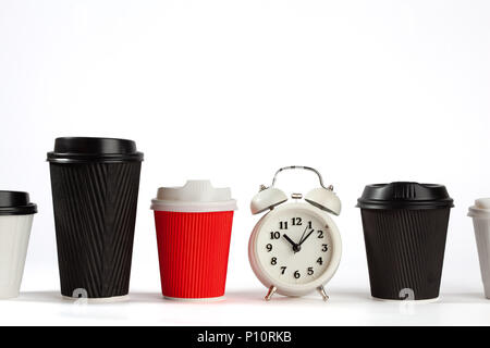 Time for coffee concept with retro alarm clock and coffee cups on white background with copy space Stock Photo