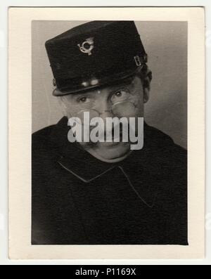 THE CZECHOSLOVAK REPUBLIC - CIRCA 1940s: Vintage photo of postman. Stock Photo