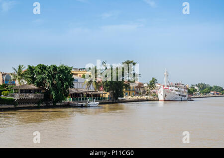 Senegal River with waterfront and historical ship in town Staint-Louis Stock Photo