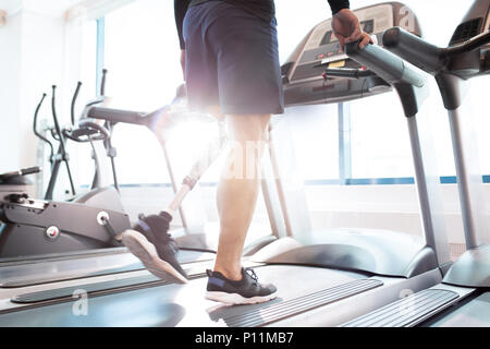 Running on treadmill Stock Photo