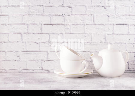 Two cups and teapot for morning tea. Copy space. Stock Photo