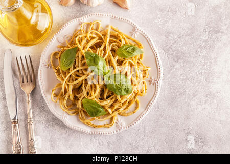 Pasta with homemade pesto sauce. Top view. Stock Photo