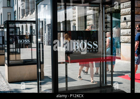 Berlin, Germany - june 09, 2018: The logo / brand name of HUGO BOSS on shop facade exterior in Berlin, Germany Stock Photo
