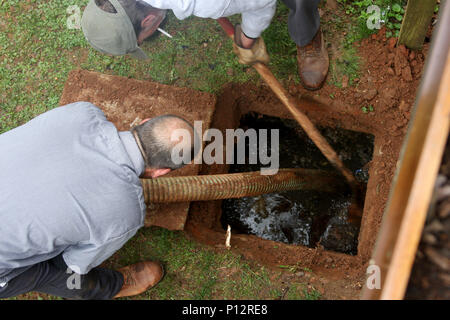 Emptying a septic tank Stock Photo