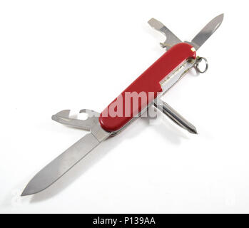 NEW YORK, NY - APRIL 19, 2016: Red multipurpose Swiss Army knife with tools extended (knife, bottle opener, screwdriver, etc.) - isolated Stock Photo