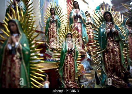 Statues of the Our Lady of Guadalupe outside the Our Lady of Guadalupe Basilica in Mexico City. Hundreds of thousands of Mexican pilgrims converged on Stock Photo
