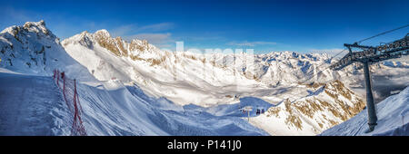 Stunning winter panorama in Tonale ski resort. View of Adamello, Presanella mountains from Tonale town, Italian Alps, Europe.