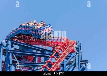 People at the top of The Big One roller coaster, Blackpool Pleasure Beach, Lancashire, England, UK Stock Photo