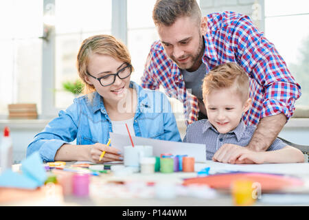 Loving Family Expressing Creativity Stock Photo