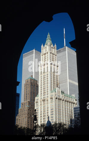 The Woolworth Building snd World Trade Towers seen through an arch of the Municipal Building in Lower Manhattan, 1999, NYC, USA Stock Photo