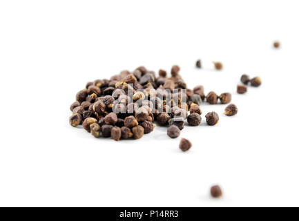 Macro of organic grains of paradise (Aframomum melegueta) isolated, white background Stock Photo