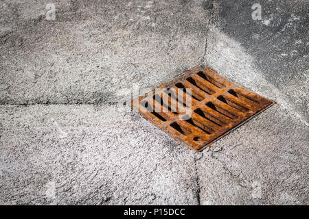 Old rusty street grate near the sea in Cres (Croatia) Stock Photo