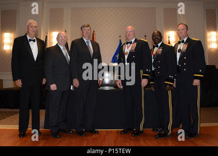 past and present, attended the 36th Infantry Division’s “Hail and Farewell” dining out May 6th, 2017 in Austin, Texas.  The event helped celebrate the 100 year anniversary of the division.  From left: Maj. Gen. (Ret) Don Daniels, Maj. Gen. (Ret) Robert Halverson, Maj. Gen. (Ret) Eddy Spurgin, Maj. Gen. James K. “Red” Brown, Deputy Commanding General – Reserve Component, United States Forces Command, Maj. Gen. Lester Simpson, former 36th Inf. Div. Commanding General, and Brig. Gen. S. Lee Henry, 36th Inf. Div. Commanding General. Stock Photo