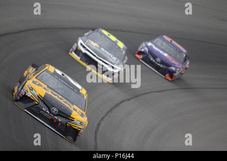 Brooklyn, Michigan, USA. 10th June, 2018. Erik Jones (20) races off turn one during the FireKeepers Casino 400 at Michigan International Speedway in Brooklyn, Michigan. Credit: Stephen A. Arce/ASP/ZUMA Wire/Alamy Live News Stock Photo