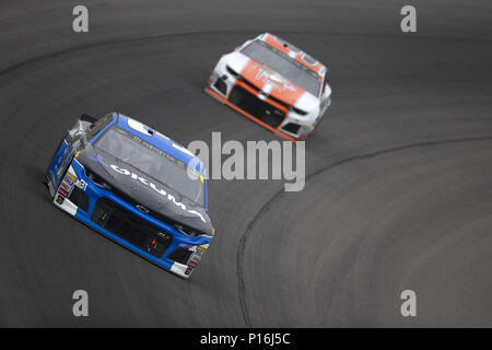 Brooklyn, Michigan, USA. 10th June, 2018. Ryan Newman (31) races off turn one during the FireKeepers Casino 400 at Michigan International Speedway in Brooklyn, Michigan. Credit: Stephen A. Arce/ASP/ZUMA Wire/Alamy Live News Stock Photo